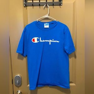 Selling a lightly worn Royal Blue Cotton T-Shirt. Size MEDIUM.